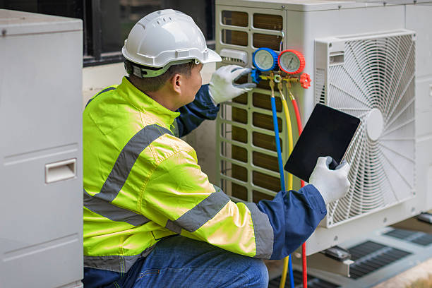 Professional Air Duct Cleaning technician working in Glenmont, MD